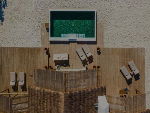 Aerial view of a modern poolside terrace.