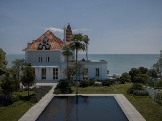 Elegant house by the sea with lush gardens