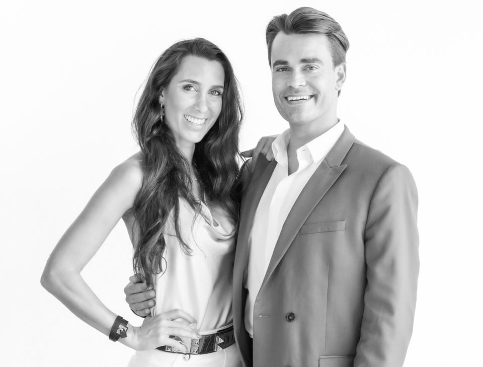 Smiling couple posing together in monochrome photo