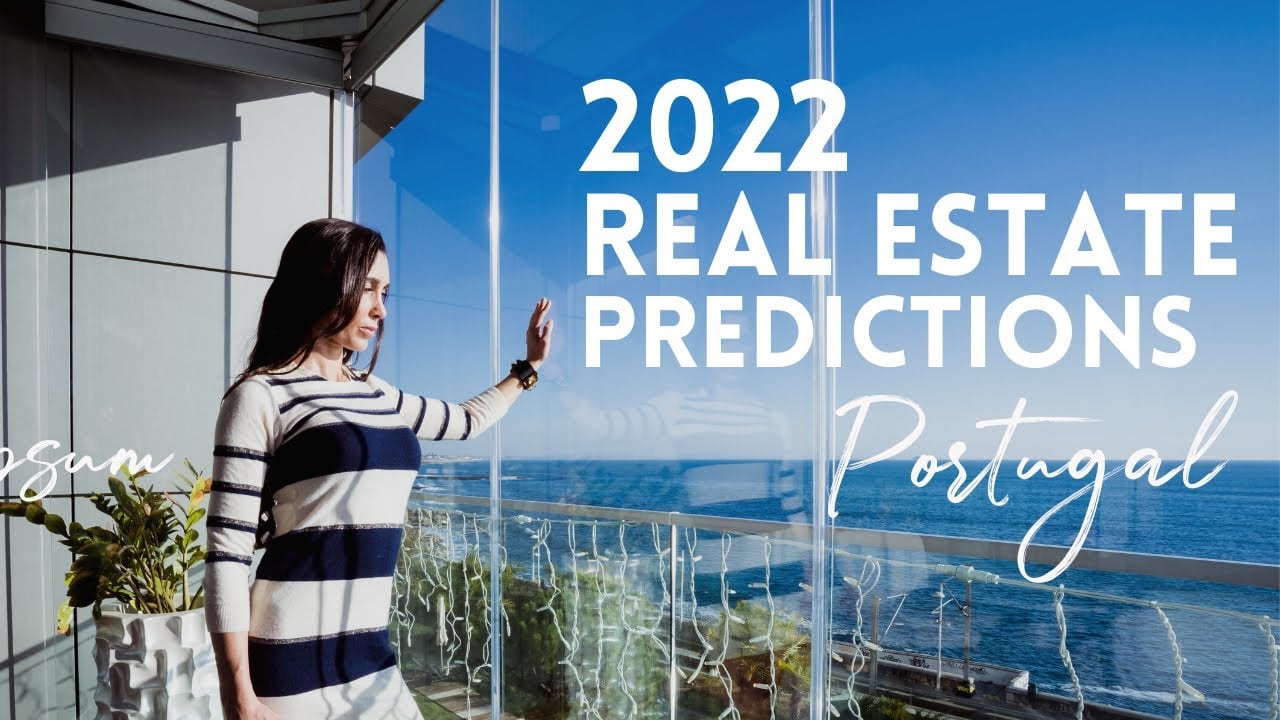 Woman views ocean while discussing real estate predictions.