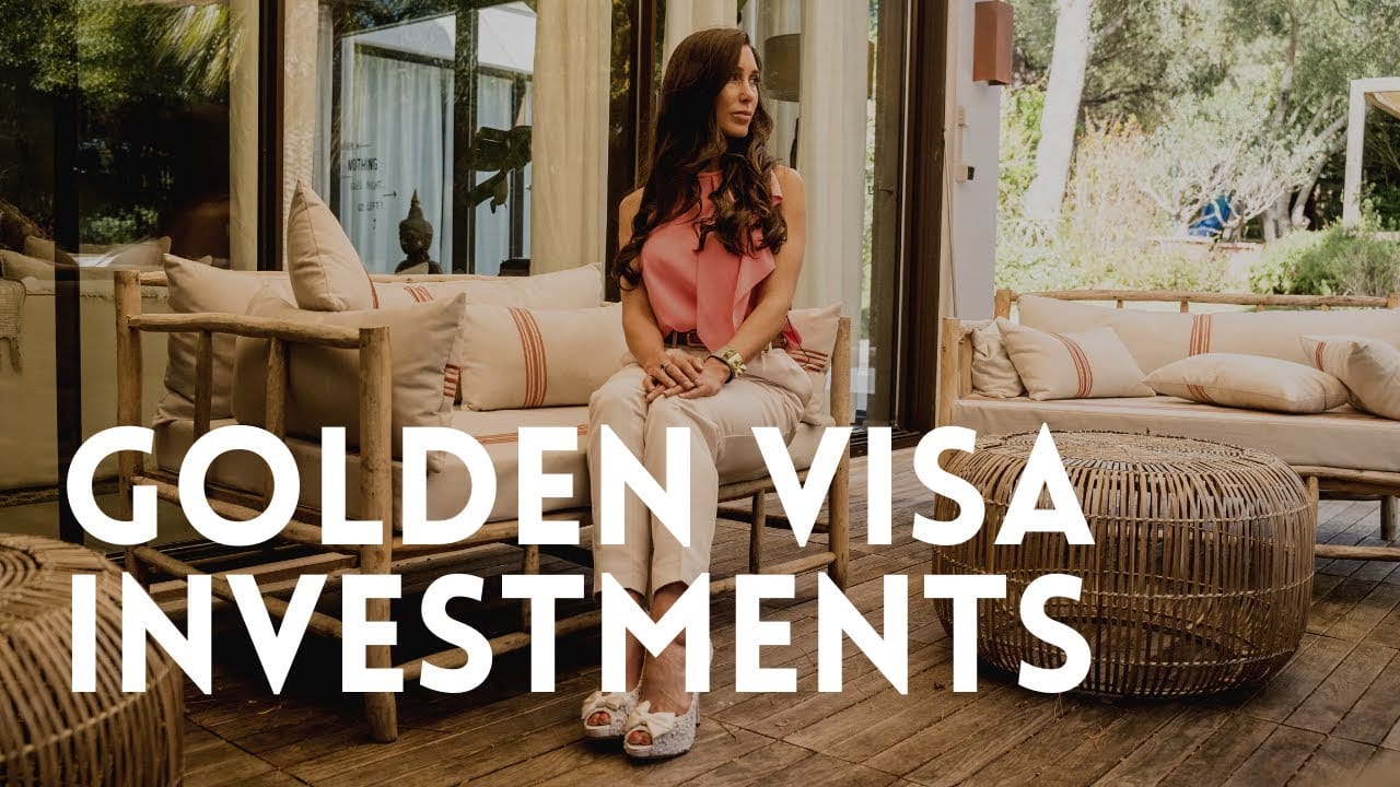 Person discussing golden visa investment options indoors.