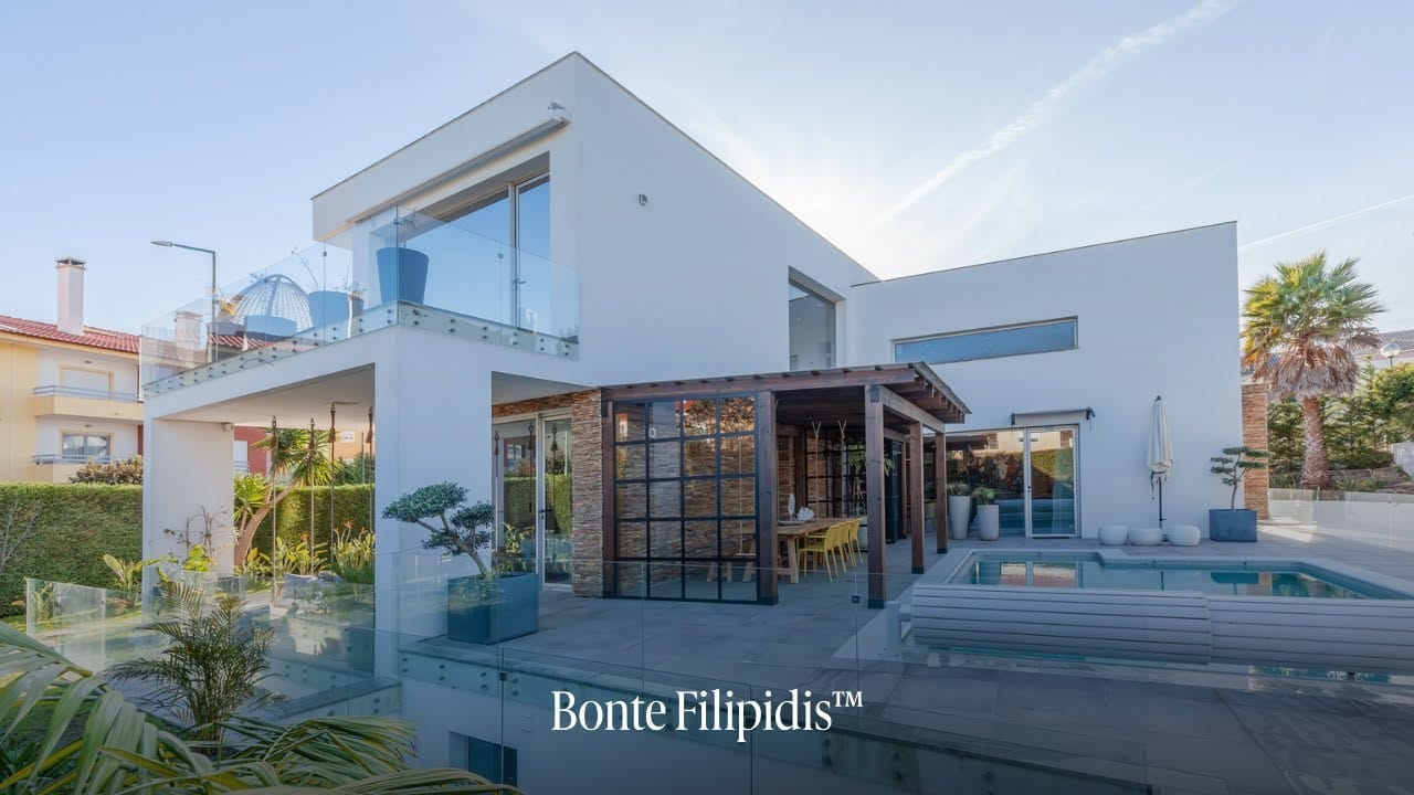 Modern house with glass architecture and swimming pool