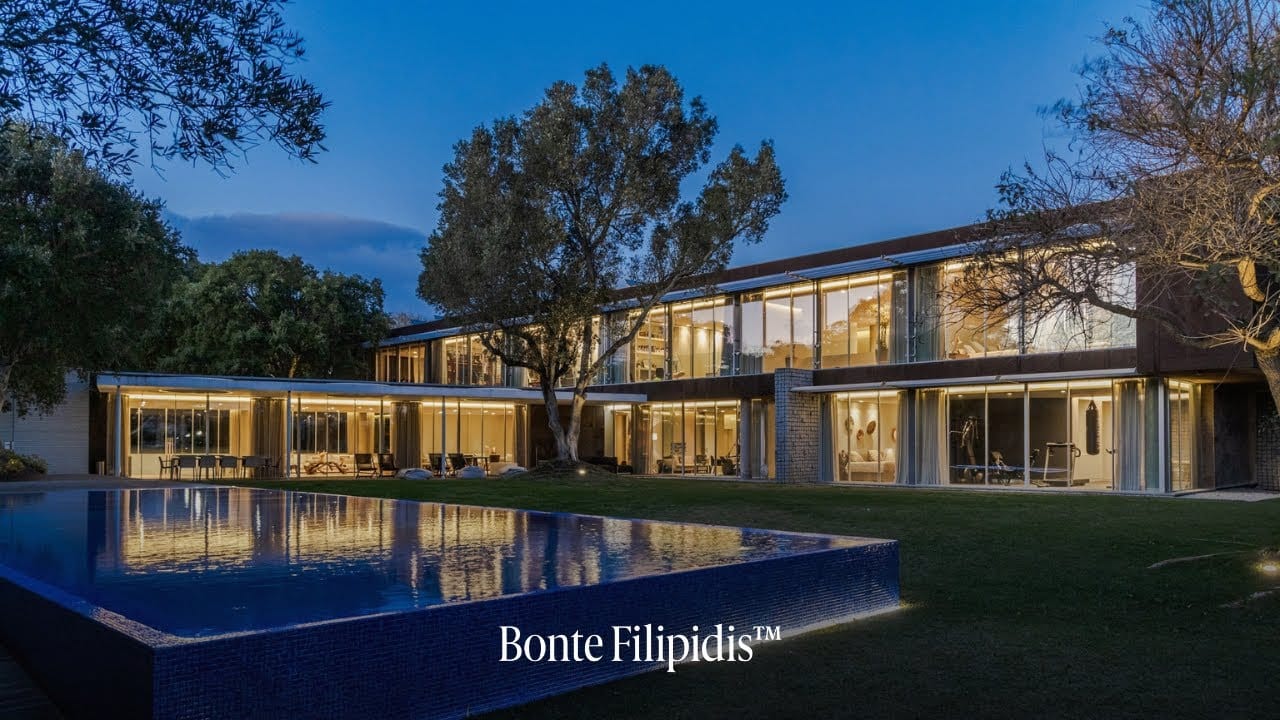 Modern house with swimming pool at twilight