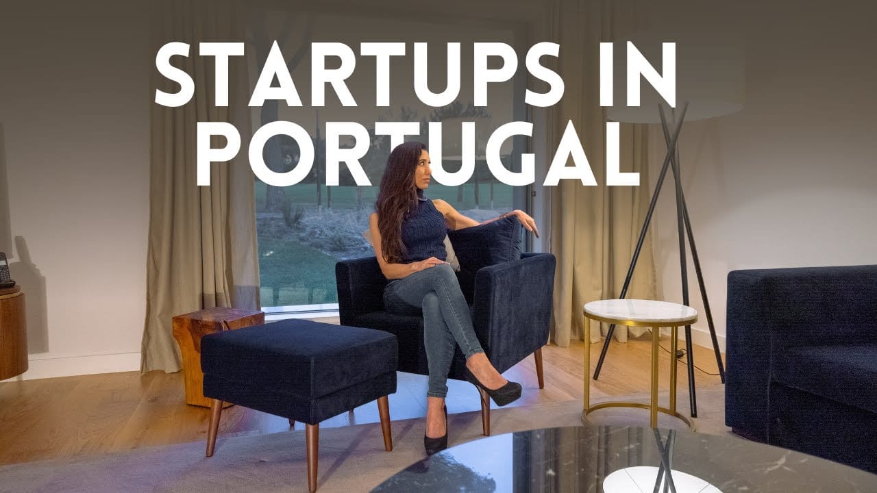 Woman discussing startups in a stylish setting.